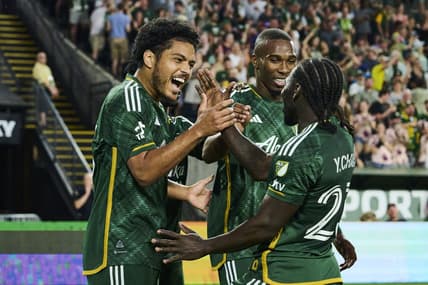 May 13, 2023; Portland, Oregon, USA; Portland Timbers midfielder Evander (20) celebrates with teammates after scoring a goal in the second half against the Vancouver Whitecaps at Providence Park. Mandatory Credit: Troy Wayrynen-USA TODAY Sports