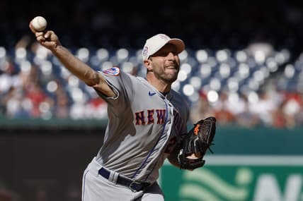 May 14, 2023; Washington, District of Columbia, USA; New York Mets starting pitcher Max Scherzer (21) pitches against the Washington Nationals during the first inning at Nationals Park. Mandatory Credit: Geoff Burke-USA TODAY Sports