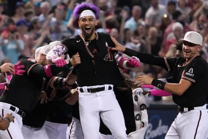 May 14, 2023; Phoenix, Arizona, USA; Arizona Diamondbacks left fielder Lourdes Gurriel Jr. (12) celebrates after hitting a walk off RBI double against the San Francisco Giants during the ninth inning at Chase Field. Mandatory Credit: Joe Camporeale-USA TODAY Sports