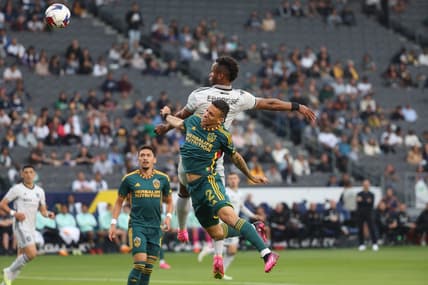 May 14, 2023; Carson, California, USA; San Jose Earthquakes forward Jeremy Ebobisse (11) heads the ball over Los Angeles Galaxy defender Calegari (2) during the first half at Dignity Health Sports Park. Mandatory Credit: Kiyoshi Mio-USA TODAY Sports