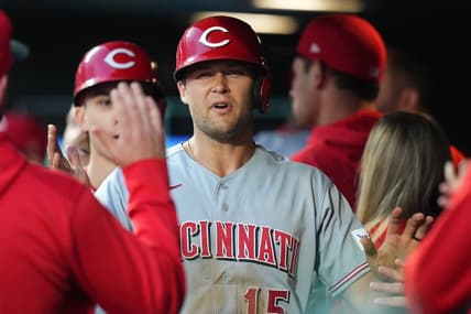May 15, 2023; Denver, Colorado, USA; Cincinnati Reds center fielder Nick Senzel (15) celebrates scoring a run in the fourth inning against the Colorado Rockies at Coors Field. Mandatory Credit: Ron Chenoy-USA TODAY Sports