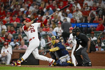 May 15, 2023; St. Louis, Missouri, USA;  St. Louis Cardinals third baseman Nolan Arenado (28) hits a one run sacrifice fly against the Milwaukee Brewers during the sixth inning at Busch Stadium. Mandatory Credit: Jeff Curry-USA TODAY Sports