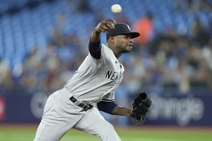 May 16, 2023; Toronto, Ontario, CAN; New York Yankees pitcher Domingo German (0) pitches to the Toronto Blue Jays during the first inning at Rogers Centre. Mandatory Credit: John E. Sokolowski-USA TODAY Sports