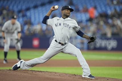 May 16, 2023; Toronto, Ontario, CAN; New York Yankees starting pitcher Domingo German (0) pitches to the Toronto Blue Jays during the first inning at Rogers Centre. Mandatory Credit: John E. Sokolowski-USA TODAY Sports