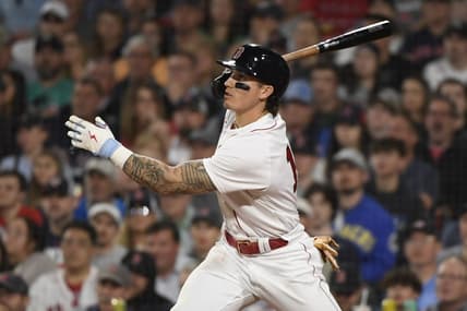 May 16, 2023; Boston, Massachusetts, USA; Boston Red Sox center fielder Jarren Duran (16) hits an RBI single during the seventh inning against the Seattle Mariners at Fenway Park. Mandatory Credit: Bob DeChiara-USA TODAY Sports