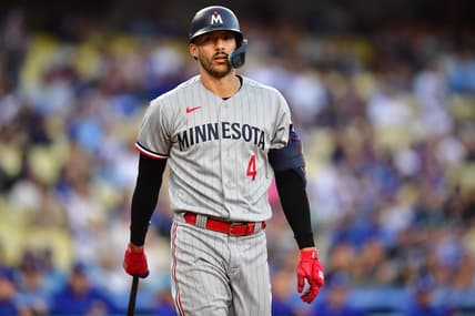 May 16, 2023; Los Angeles, California, USA; Minnesota Twins shortstop Carlos Correa (4) reacts after striking out against the Los Angeles Dodgers during the first inning at Dodger Stadium. Mandatory Credit: Gary A. Vasquez-USA TODAY Sports