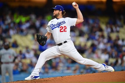 May 16, 2023; Los Angeles, California, USA; Los Angeles Dodgers starting pitcher Clayton Kershaw (22) throws against the Minnesota Twins during the second inning at Dodger Stadium. Mandatory Credit: Gary A. Vasquez-USA TODAY Sports