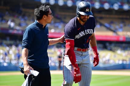 May 17, 2023; Los Angeles, California, USA; Minnesota Twins right fielder Joey Gallo (13) leaves after suffering an apparent injury during his at bat against the Los Angeles Dodgers during the ninth inning at Dodger Stadium. Mandatory Credit: Gary A. Vasquez-USA TODAY Sports