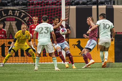 May 17, 2023; Atlanta, Georgia, USA; Colorado Rapids midfielder Danny Leyva (15) is called for a hand foul after blocking a shot by Atlanta United midfielder Luiz Araujo (10) during the first half at Mercedes-Benz Stadium. Mandatory Credit: Dale Zanine-USA TODAY Sports