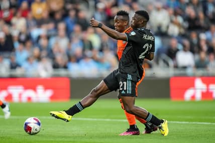 May 17, 2023; Saint Paul, Minnesota, USA; Minnesota United forward Bongokuhle Hlongwane (21) shoots during the first half against Houston Dynamo at Allianz Field. Mandatory Credit: Brace Hemmelgarn-USA TODAY Sports