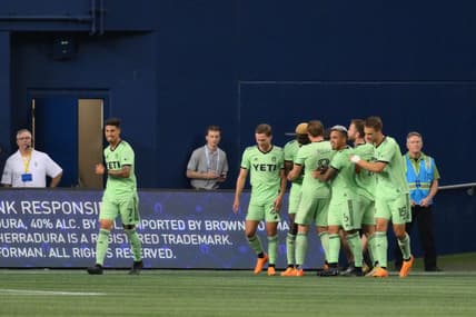 May 17, 2023; Seattle, Washington, USA; The Austin FC celebrate after forward Gyasi Zardes (9) scored a goal against the Seattle Sounders during the second half at Lumen Field. Mandatory Credit: Steven Bisig-USA TODAY Sports