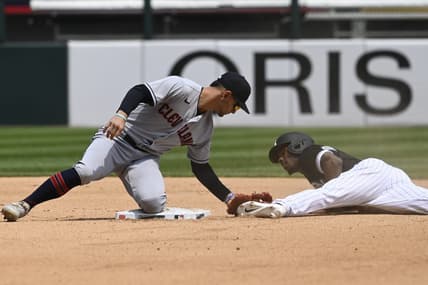 May 18, 2023; Chicago, Illinois, USA; Chicago White Sox shortstop Tim Anderson (7) is caught stealing by Cleveland Guardians second baseman Andres Gimenez (0) during the third inning at Guaranteed Rate Field. Mandatory Credit: Matt Marton-USA TODAY Sports