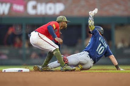 May 19, 2023; Cumberland, Georgia, USA; Seattle Mariners left fielder Jarred Kelenic (10) is tagged out by Atlanta Braves second baseman Ozzie Albies (1) while trying to steal second base during the fourth inning at Truist Park. Mandatory Credit: Dale Zanine-USA TODAY Sports