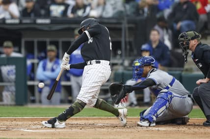 May 19, 2023; Chicago, Illinois, USA; Chicago White Sox first baseman Andrew Vaughn (25) singles against the Kansas City Royals during the second inning at Guaranteed Rate Field. Mandatory Credit: Kamil Krzaczynski-USA TODAY Sports