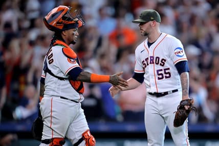 May 20, 2023; Houston, Texas, USA; Houston Astros relief pitcher Ryan Pressly (55) shakes hands with Houston Astros catcher Martin Maldonado (15) after the final out against the Oakland Athletics during the ninth inning at Minute Maid Park. Mandatory Credit: Erik Williams-USA TODAY Sports