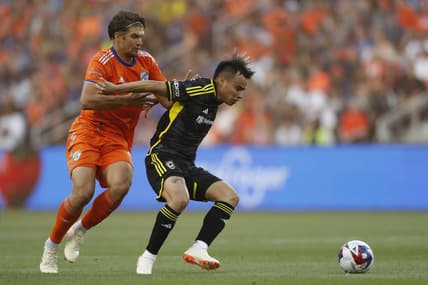 May 20, 2023; Cincinnati, Ohio, USA; FC Cincinnati defender Nick Hagglund (4) battles for the ball against Columbus Crew midfielder Lucas Zelarrayan (10) at TQL Stadium. Mandatory Credit: Katie Stratman-USA TODAY Sports