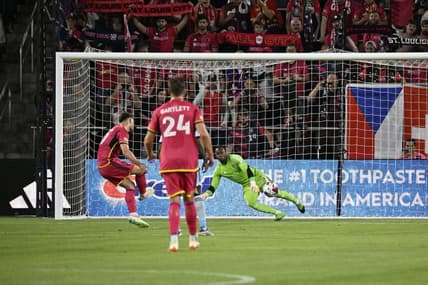 May 20, 2023; St. Louis, Missouri, USA; St. Louis City midfielder Eduard Lowen (10) scores the opening with a penalty kick during the first half against the Sporting Kansas City at CITYPARK. Mandatory Credit: Scott Rovak-USA TODAY Sports