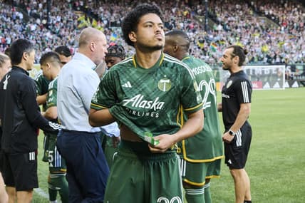 May 20, 2023; Portland, Oregon, USA; Portland Timbers midfielder Evander (20) prepares on the sidelines before a game against Minnesota United at Providence Park. Mandatory Credit: Troy Wayrynen-USA TODAY Sports