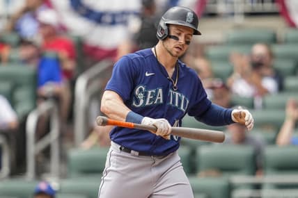 May 21, 2023; Cumberland, Georgia, USA; Seattle Mariners left fielder Jarred Kelenic (10) reacts after striking out against the Atlanta Braves during the ninth inning at Truist Park. Mandatory Credit: Dale Zanine-USA TODAY Sports