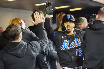 May 21, 2023; New York City, New York, USA; New York Mets shortstop Francisco Lindor (12) is congratulated by teammates after hitting a home run against the Cleveland Guardians during the sixth inning at Citi Field. Mandatory Credit: Gregory Fisher-USA TODAY Sports