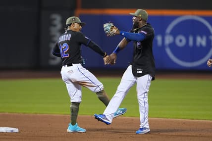 May 21, 2023; New York City, New York, USA; New York Mets shortstop Francisco Lindor (12) and right fielder Starling Marte (6) low five to celebrate the victory after the game against the Cleveland Guardians at Citi Field. Mandatory Credit: Gregory Fisher-USA TODAY Sports
