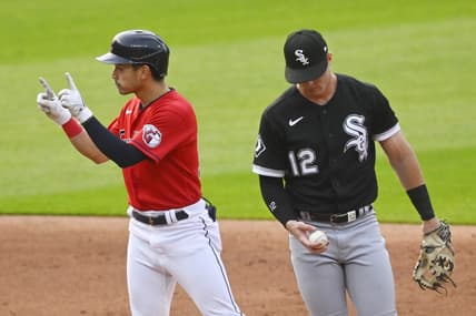 May 22, 2023; Cleveland, Ohio, USA; Cleveland Guardians left fielder Steven Kwan (38) celebrates his double beside Chicago White Sox second baseman Romy Gonzalez (12) in the third inning at Progressive Field. Mandatory Credit: David Richard-USA TODAY Sports