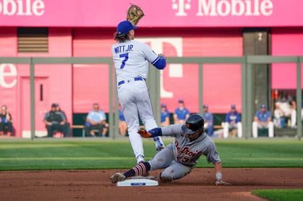 May 22, 2023; Kansas City, Missouri, USA; Kansas City Royals shortstop Bobby Witt Jr. (7) can   t make the tag as Detroit Tigers second baseman Zach McKinstry (39) reaches second base in the first inning at Kauffman Stadium. Mandatory Credit: Denny Medley-USA TODAY Sports