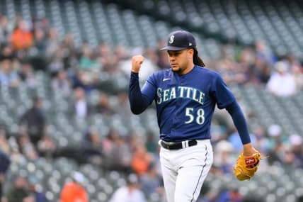 May 22, 2023; Seattle, Washington, USA; Seattle Mariners starting pitcher Luis Castillo (58) celebrates getting the final out of the first inning against the Oakland Athletics at T-Mobile Park. Mandatory Credit: Steven Bisig-USA TODAY Sports