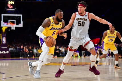 May 22, 2023; Los Angeles, California, USA; Los Angeles Lakers forward LeBron James (6) drives to the basket against Denver Nuggets forward Aaron Gordon (50) during the third quarter in game four of the Western Conference Finals for the 2023 NBA playoffs at Crypto.com Arena. Mandatory Credit: Gary A. Vasquez-USA TODAY Sports