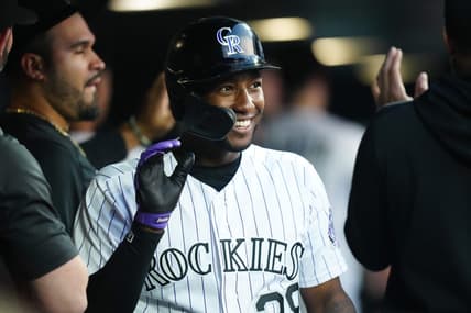 May 23, 2023; Denver, Colorado, USA; Colorado Rockies left fielder Jurickson Profar (29) celebrates scoring a run in the fifth inning against the Miami Marlins at Coors Field. Mandatory Credit: Ron Chenoy-USA TODAY Sports