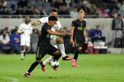 May 23, 2023; Los Angeles, CA, USA;  Los Angeles FC defender Erik Duenas (18) is fouled by Los Angeles Galaxy defender Calegari (2) during the first half of the the US Open Cup game at BMO Stadium. Mandatory Credit: Kiyoshi Mio-USA TODAY Sports