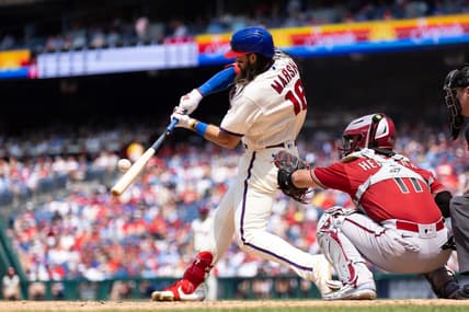 May 24, 2023; Philadelphia, Pennsylvania, USA; Philadelphia Phillies center fielder Brandon Marsh (16) hits a single during the fifth inning against the Arizona Diamondbacks at Citizens Bank Park. Mandatory Credit: Bill Streicher-USA TODAY Sports