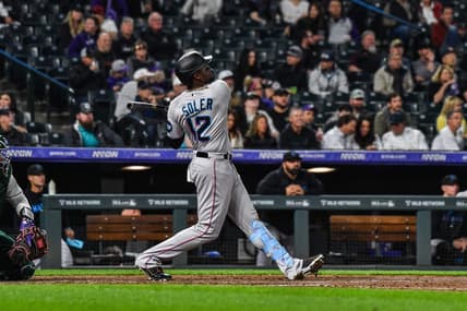 May 24, 2023; Denver, Colorado, USA; Miami Marlins right fielder Jorge Soler (12) hits a home run against the Colorado Rockies at Coors Field. Mandatory Credit: John Leyba-USA TODAY Sports