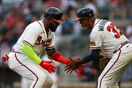 May 25, 2023; Atlanta, Georgia, USA; Atlanta Braves designated hitter Marcell Ozuna (20) celebrates with third base coach Ron Washington (37) after a home run against the Philadelphia Phillies in the second inning at Truist Park. Mandatory Credit: Brett Davis-USA TODAY Sports