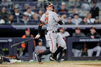 May 25, 2023; Bronx, New York, USA; Baltimore Orioles left fielder Austin Hays (21) follows through on a two run double against the New York Yankees during the eighth inning at Yankee Stadium. Mandatory Credit: Brad Penner-USA TODAY Sports