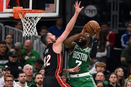 May 25, 2023; Boston, Massachusetts, USA; Boston Celtics guard Jaylen Brown (7) shoots against Miami Heat forward Kevin Love (42) in the fourth quarter during game five of the Eastern Conference Finals for the 2023 NBA playoffs at TD Garden. Mandatory Credit: Brian Fluharty-USA TODAY Sports