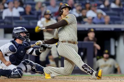 May 26, 2023; Bronx, New York, USA; San Diego Padres left fielder Juan Soto (22) follows through on a two run home run against the New York Yankees during the fifth inning at Yankee Stadium. Mandatory Credit: Brad Penner-USA TODAY Sports
