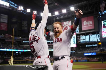 May 26, 2023; Phoenix, Arizona, USA; Boston Red Sox shortstop Enrique Hernandez (5) celebrates with Boston Red Sox third baseman Justin Turner (2) after hitting a two run home run against the Arizona Diamondbacks during the third inning at Chase Field. Mandatory Credit: Joe Camporeale-USA TODAY Sports