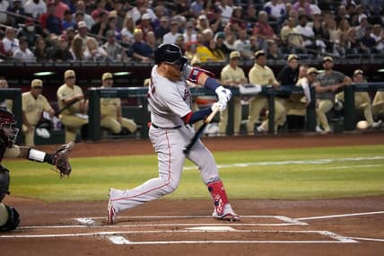 May 26, 2023; Phoenix, Arizona, USA; Boston Red Sox third baseman Justin Turner (2) hits a double against the Arizona Diamondbacks during the first inning at Chase Field. Mandatory Credit: Joe Camporeale-USA TODAY Sports