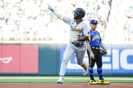 May 26, 2023; Seattle, Washington, USA; Pittsburgh Pirates designated hitter Andrew McCutchen (22) celebrates while running the bases after hitting a solo-home run against the Seattle Mariners during the first inning at T-Mobile Park. Mandatory Credit: Joe Nicholson-USA TODAY Sports
