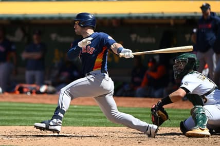 May 27, 2023; Oakland, California, USA; Houston Astros infielder Alex Bregman (2) hits an RBI double against the Oakland Athletics during the eighth inning at Oakland-Alameda County Coliseum. Mandatory Credit: Robert Edwards-USA TODAY Sports