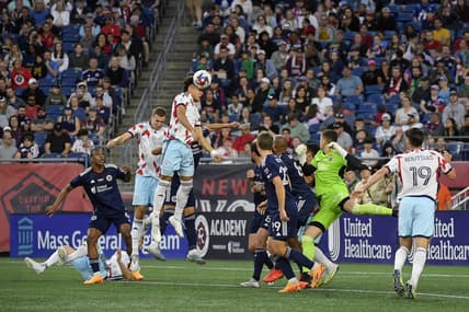 May 27, 2023; Foxborough, Massachusetts, USA; Chicago Fire defender Kendall Burks (27) heads the ball against the New England Revolution during the first half at Gillette Stadium. Mandatory Credit: Bob DeChiara-USA TODAY Sports