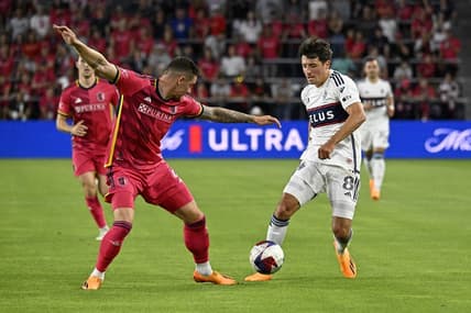 May 27, 2023; St. Louis, Missouri, USA; Vancouver Whitecaps midfielder Alessandro Schopf (8) dribbles the ball against St. Louis CITY SC defender Jake Nerwinski (2) during the first half at CITYPARK. Mandatory Credit: Scott Rovak-USA TODAY Sports