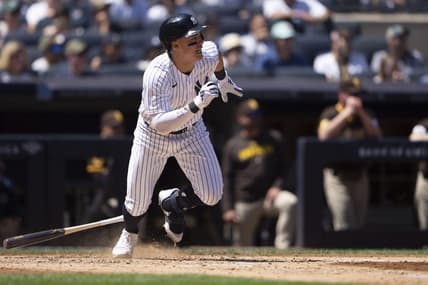 May 28, 2023; Bronx, New York, USA; New York Yankees shortstop Anthony Volpe (11) hits an RBI single against the San Diego Padres during the third inning at Yankee Stadium. Mandatory Credit: Gregory Fisher-USA TODAY Sports