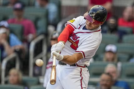 May 28, 2023; Cumberland, Georgia, USA; Atlanta Braves first baseman Matt Olson (28) hits a home run against the Philadelphia Phillies during the first inning at Truist Park. Mandatory Credit: Dale Zanine-USA TODAY Sports