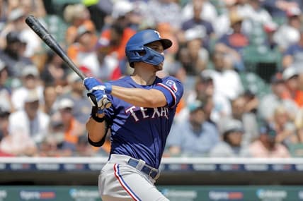May 29, 2023; Detroit, Michigan, USA;  Texas Rangers shortstop Corey Seager (5) hits a three run home run in the fifth inning against the Detroit Tigers at Comerica Park. Mandatory Credit: Rick Osentoski-USA TODAY Sports