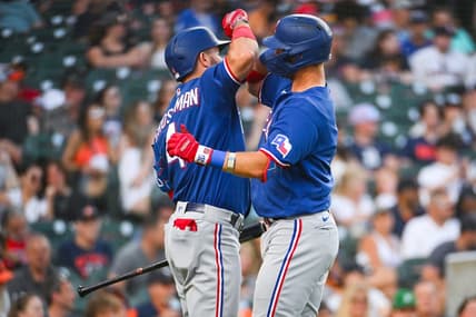 May 30, 2023; Detroit, Michigan, USA; Texas Rangers third baseman Josh Jung (6) celebrates his two run home run with designated hitter Robbie Grossman (4) during the seventh inning against the Detroit Tigers at Comerica Park. Mandatory Credit: Tim Fuller-USA TODAY Sports