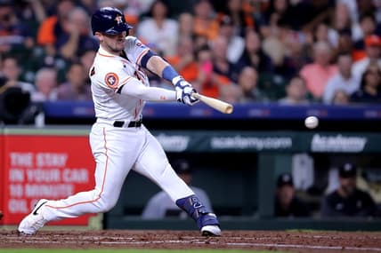 May 30, 2023; Houston, Texas, USA; Houston Astros third baseman Alex Bregman (2) hits a RBI single against the Minnesota Twins during the third inning at Minute Maid Park. Mandatory Credit: Erik Williams-USA TODAY Sports
