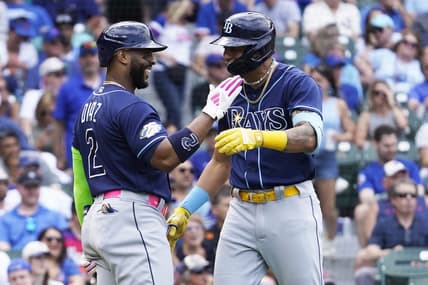 May 31, 2023; Chicago, Illinois, USA; Tampa Bay Rays center fielder Jose Siri (22) is greeted by first baseman Yandy Diaz (2) after hitting a two-run homer against the Chicago Cubs during the eighth inning at Wrigley Field. Mandatory Credit: David Banks-USA TODAY Sports