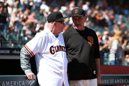 Aug 11, 2019; San Francisco, CA, USA; San Francisco Giants former manager Roger Craig and manager Bruce Bochy (15) during the 1989 team reunion before the game against the Philadelphia Phillies at Oracle Park. Mandatory Credit: Sergio Estrada-USA TODAY Sports